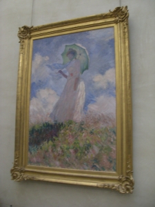"Woman with a Parasol" by Claude Monet painted in 1886