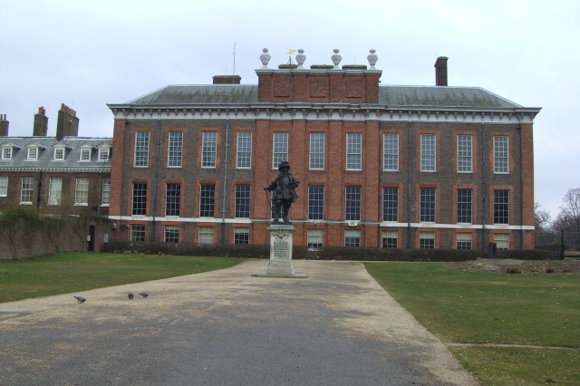 Inside the gates of Kensington Palace with a statue of King William III
